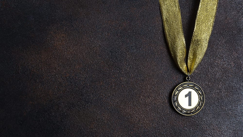 An image of a medal that reads 1